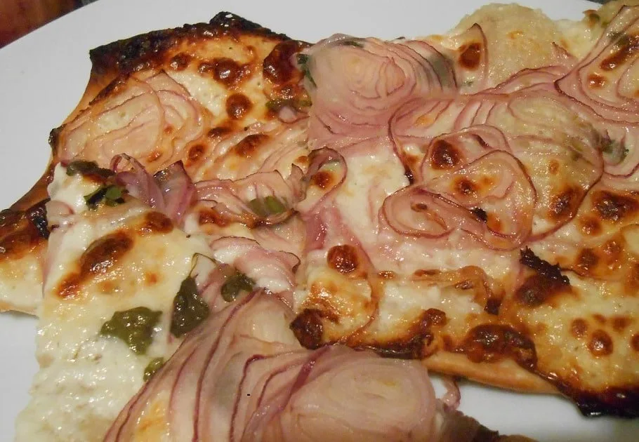 Recette de la tarte duo courgettes-oignons au chèvre